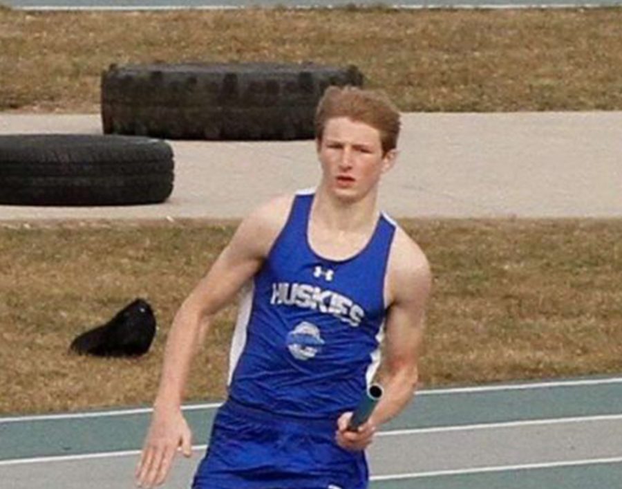 Nick Steele running his leg in a relay