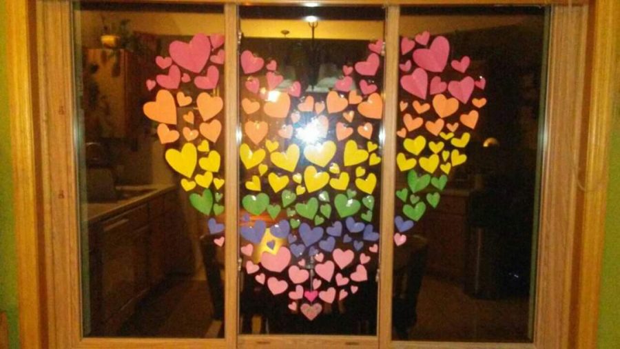 A heart made of hearts on a window
