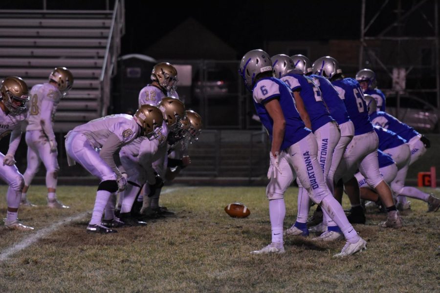 The Huskies defense lines up against the Spartans offense.