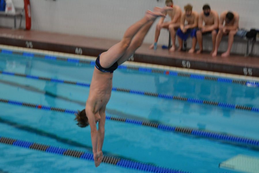 OHS senior, Jacob Fast dives into the water