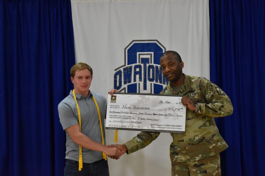 Nolan Burmeister receives his scholarship check