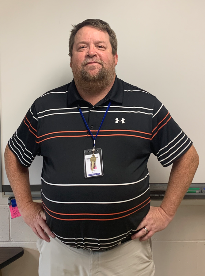 Mr. Stewart Brody, a new science teacher at OHS, standing at the front of his classroom.