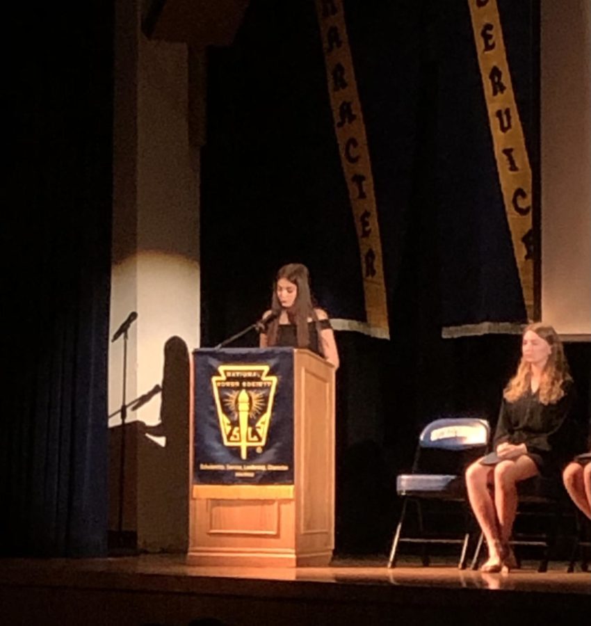 President Daniela Ortiz gives speech at NHS induction on Oct. 11.