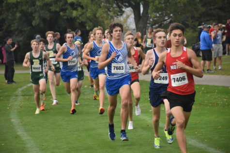 OHS Boys Cross Country running in a pack. 
