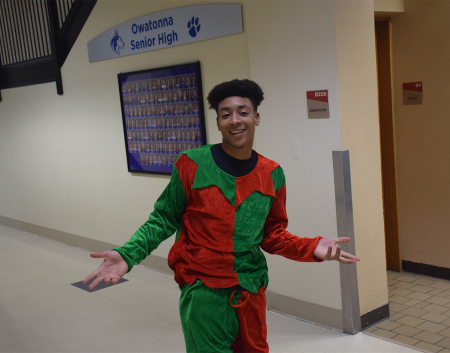 Student council member Aiden Charles poses as an elf during Ho Ho Ho Bingo 