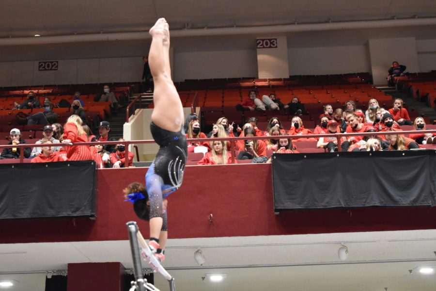 Senior Janessa Moore in her handstand on her bar routine at the MSHSL state meet.