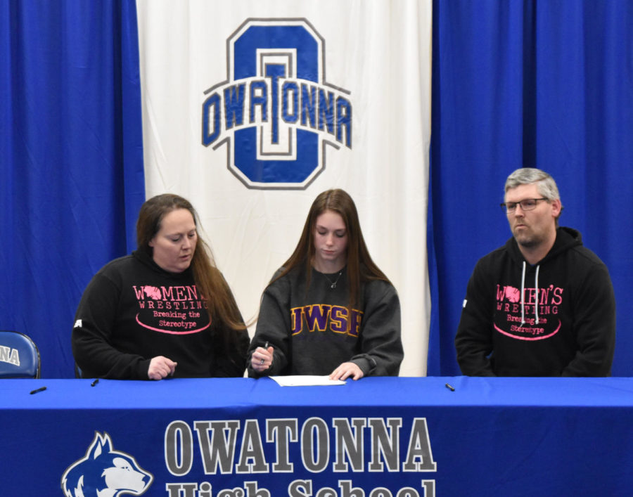 Rian Grunwald signing with University of Wisconsin-Stevens Point to continue her wrestling career.