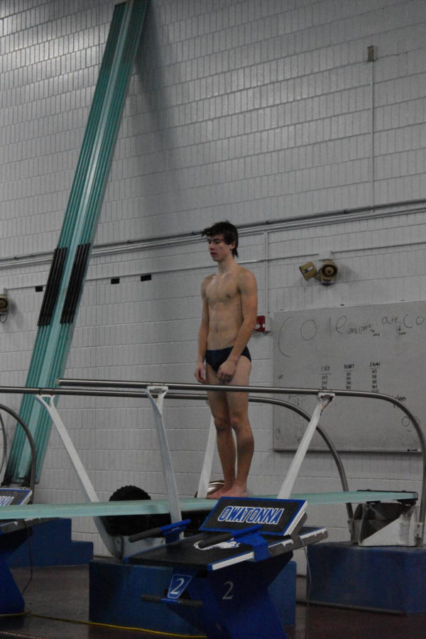 Cole Piepho getting ready to do a twist dive. 