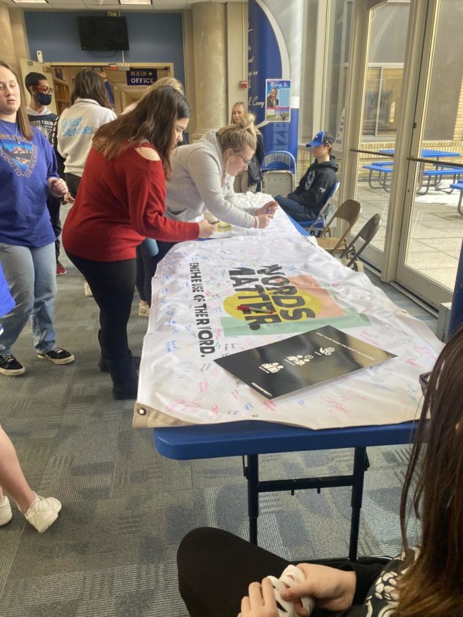 OHS students sign the pledge during lunch to end the R word.