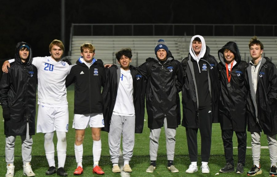THE END OF AN ERA. The seniors from the Owatonna Boys Soccer team gather together for a picture after their last ever high school soccer game.