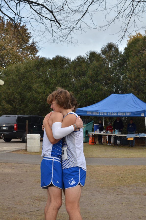 Trevor Hiatt and David Smith hugging after their last race together.