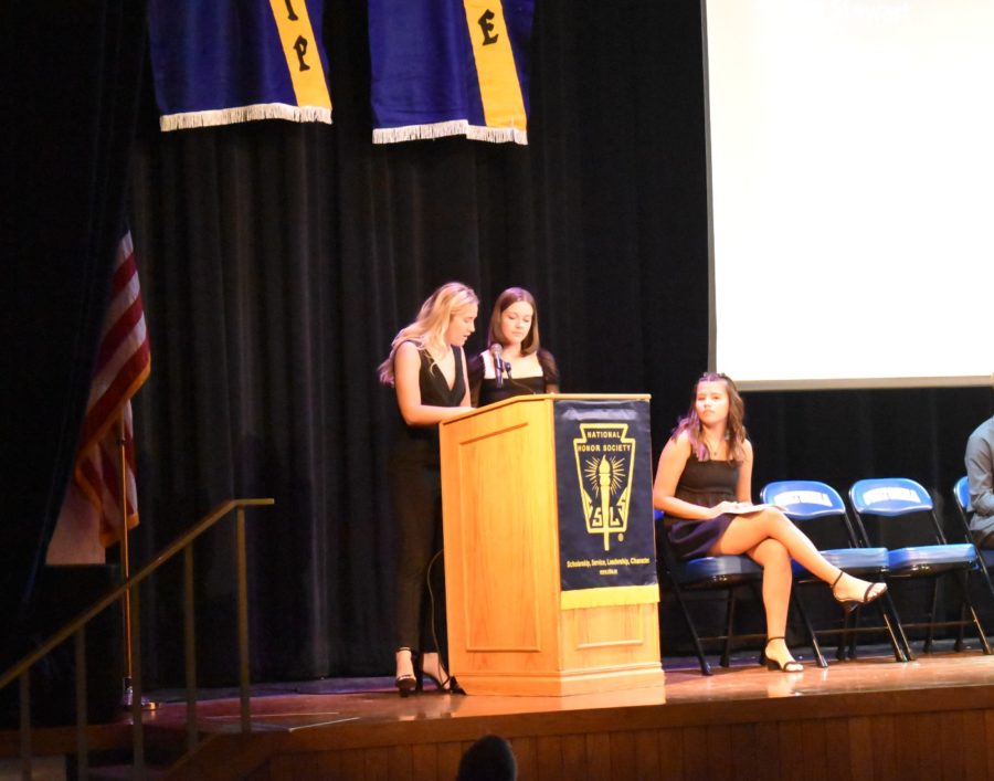 Co-secretaries Paiton Glynn and Hailey Kjersten speaking at the NHS induction ceremony.