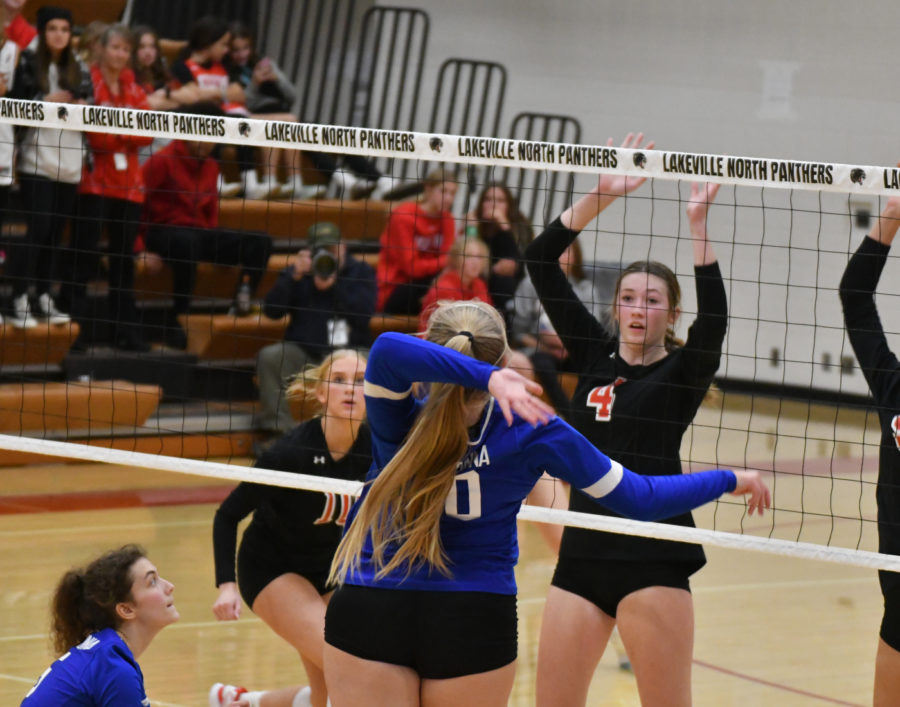 HAMMER HIT. Senior Ava Eitrheim winding up for a kill against the Panthers.