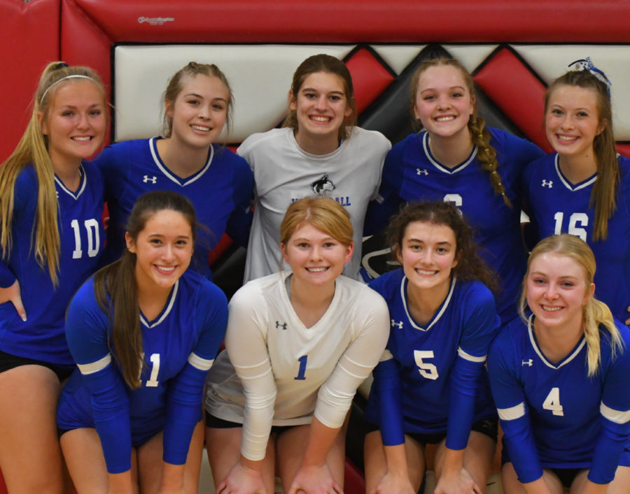 SENIOR SEND-OFF. The seniors of the Owatonna Volleyball team come together for one last senior picture after their final game.