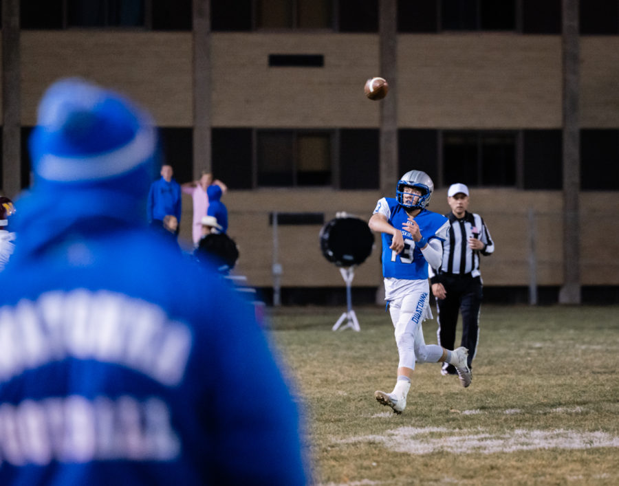 LOCKED IN. Junior quarterback Jacob Ginskey throws a spiral down the field.