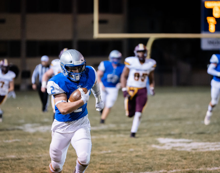LEFT IN THE DUST. Senior Conner Grems with a break away run to set them up for a touchdown.