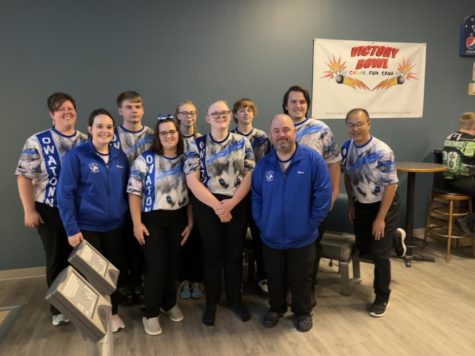 The co-ed bowling team joins together one last time to take a picture.