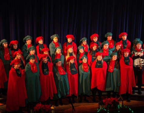 RED AND GREEN SEA. The OHS carolers fill the stage with their Christmas-colored robes.