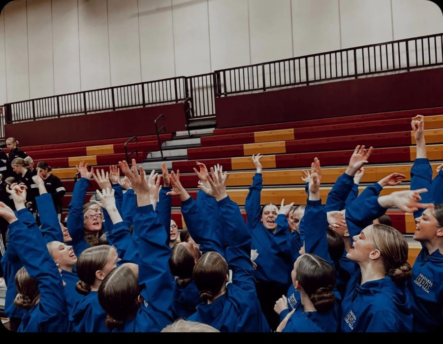 The Owatonna Dance Team celebrating their clean sweep at Northfield. 