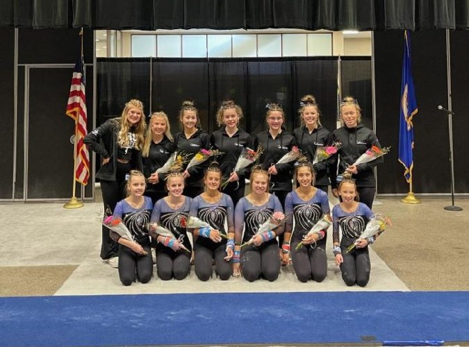 The OHS Gymnastics Team at the MSHSL State Tournament. 
Pictured left to right: (back row) Jayna Martin, Chloe Myer, Kendra Miller, Dylann Norrid, Johanna Speilman, Jozie Johnson and Brynn Roush. (Front row) McKenna Edel, Kealyn Smith, Kaitlyn Cobban, Averie Roush, Emma Johnson and Delia Neumann.