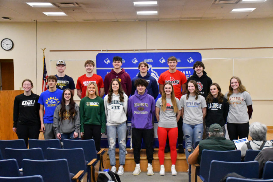 Group photo of the athletes moving onto the collegiate level.