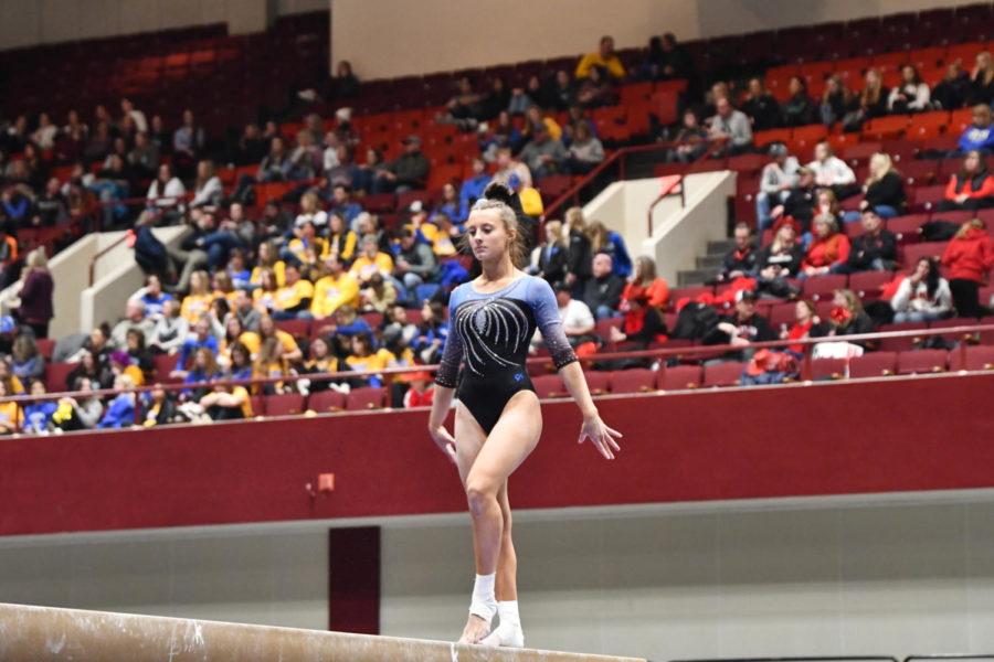 Senior Kaitlyn Cobban competing her last ever beam routine at the MSHSL State Tournament, she scored a 9.400.