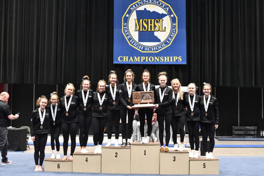The Owatonna Huskies Girls Gymnastics team after placing third at the MSHSL State Tournament. 
Pictured left to right: Dylann Norrid, Delia Neumann, Brynn Routh, Jozie Johnson, Averie Roush, Kendra Miller, Emma Johnson, Kaitlyn Cobban, Kealyn Smith, Chloe Myer, McKenna Edel and Johanna Speilman.