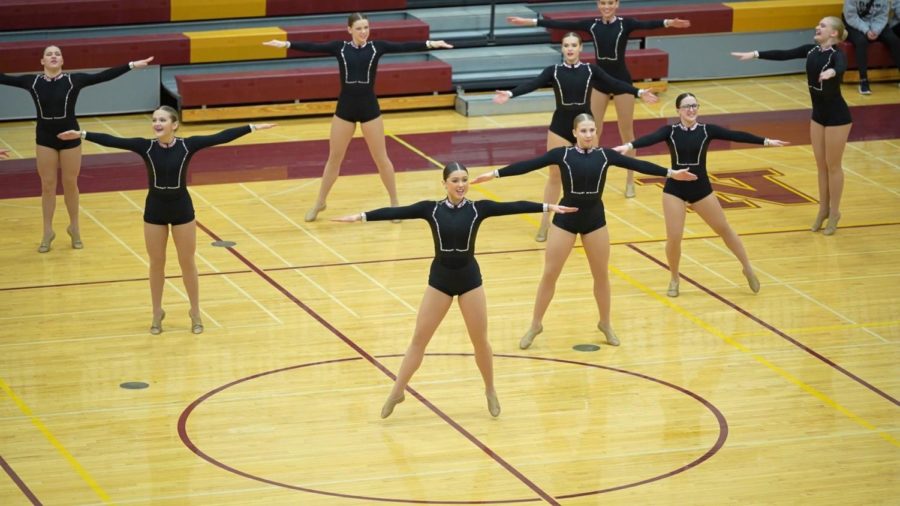 The Owatonna dance team performing at Northfield High School during a halftime performance. 