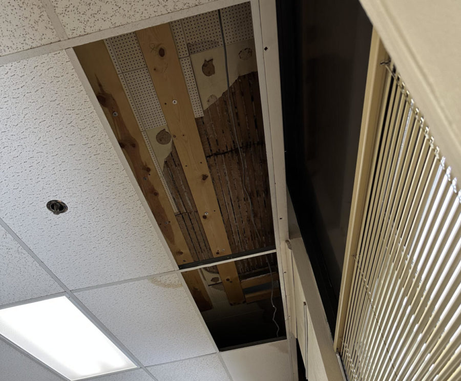 Ceiling+above+tiles+exposing+the+deterioration+of+the+current+Owatonna+High+School