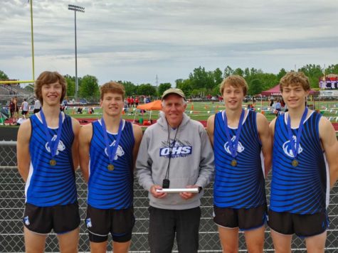 Coach Chatelaine with the  last years winning boys 4x800 relay team.