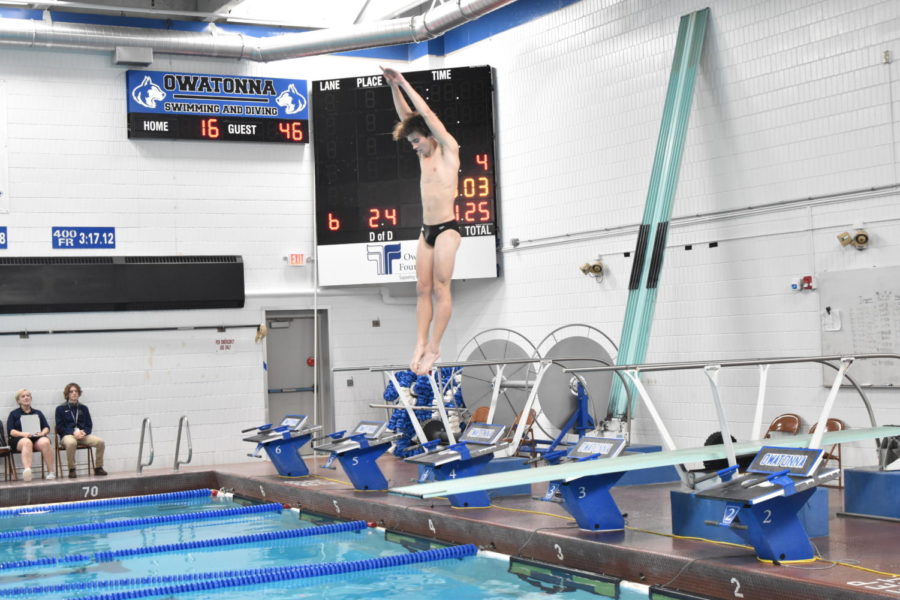 Cole Piepho attempts an epic dive at a home meet. 