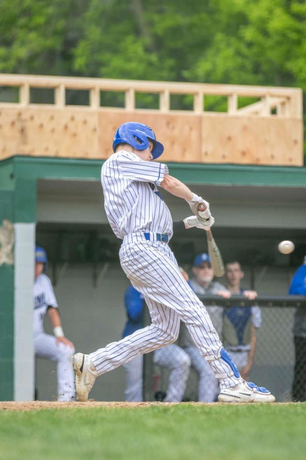 Teagun Ahrens swinging at the baseball last spring. He will play at RCTC next year. 