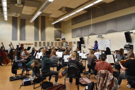 Symphony Orchestra playing one of their pieces they are performing for the Big 9 Music Festival. 