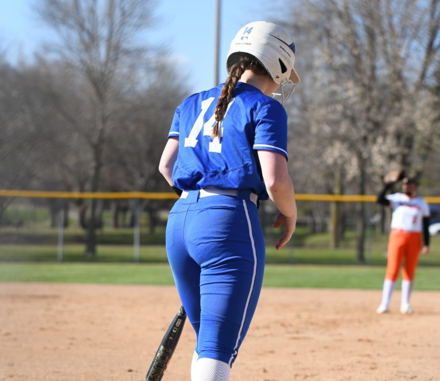 Junior Zoie Roush steps up to the batters box, getting ready for the next pitch.