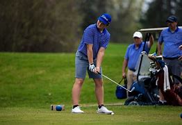 Junior Captain Quinn Thompson is ready to tee off his round. 