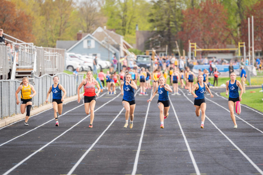 Owatonna Girls Track sprinters race to the finish line during the last meet at OHS.