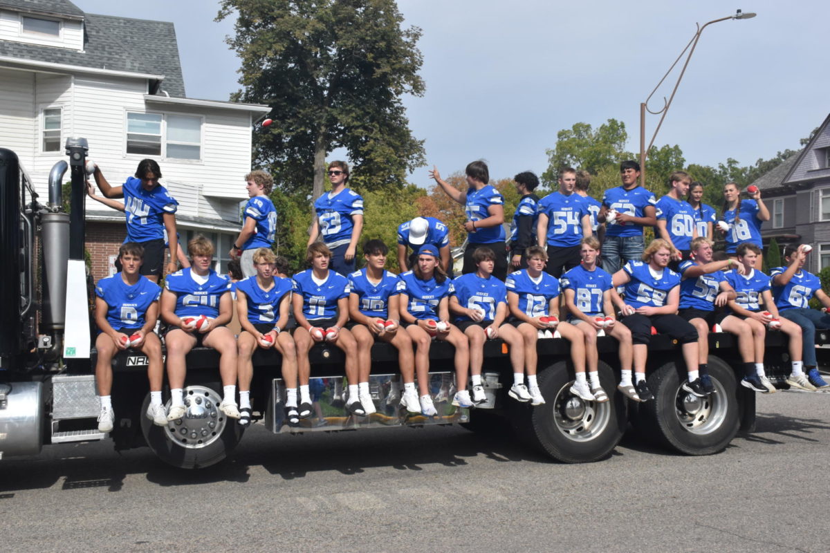 OHS Football Team going through the homecoming parade.