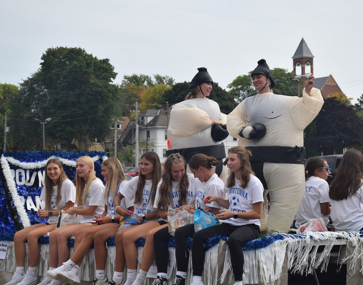 OHS Girls Soccer Team going through the homecoming parade.