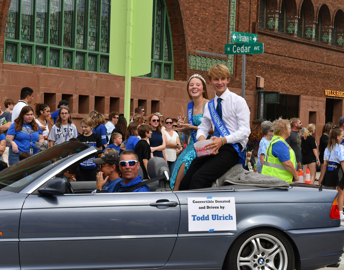 Top 5 Candidates Elizabeth Radel and Henry Hilgendorf going through the parade.