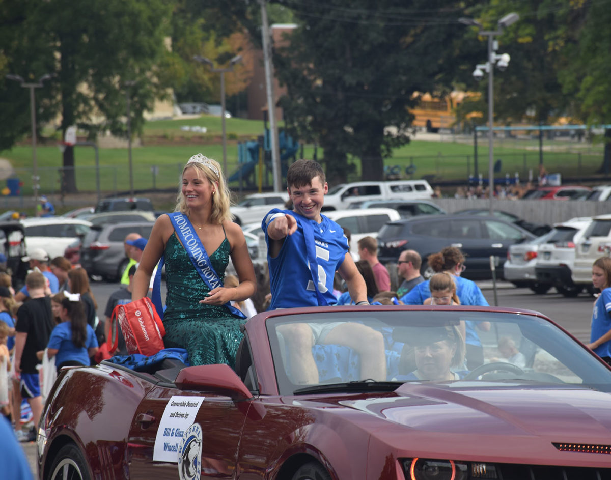 Top 5 Candidates Ethan Armstrong and Molly Achterkirch going through the parade.