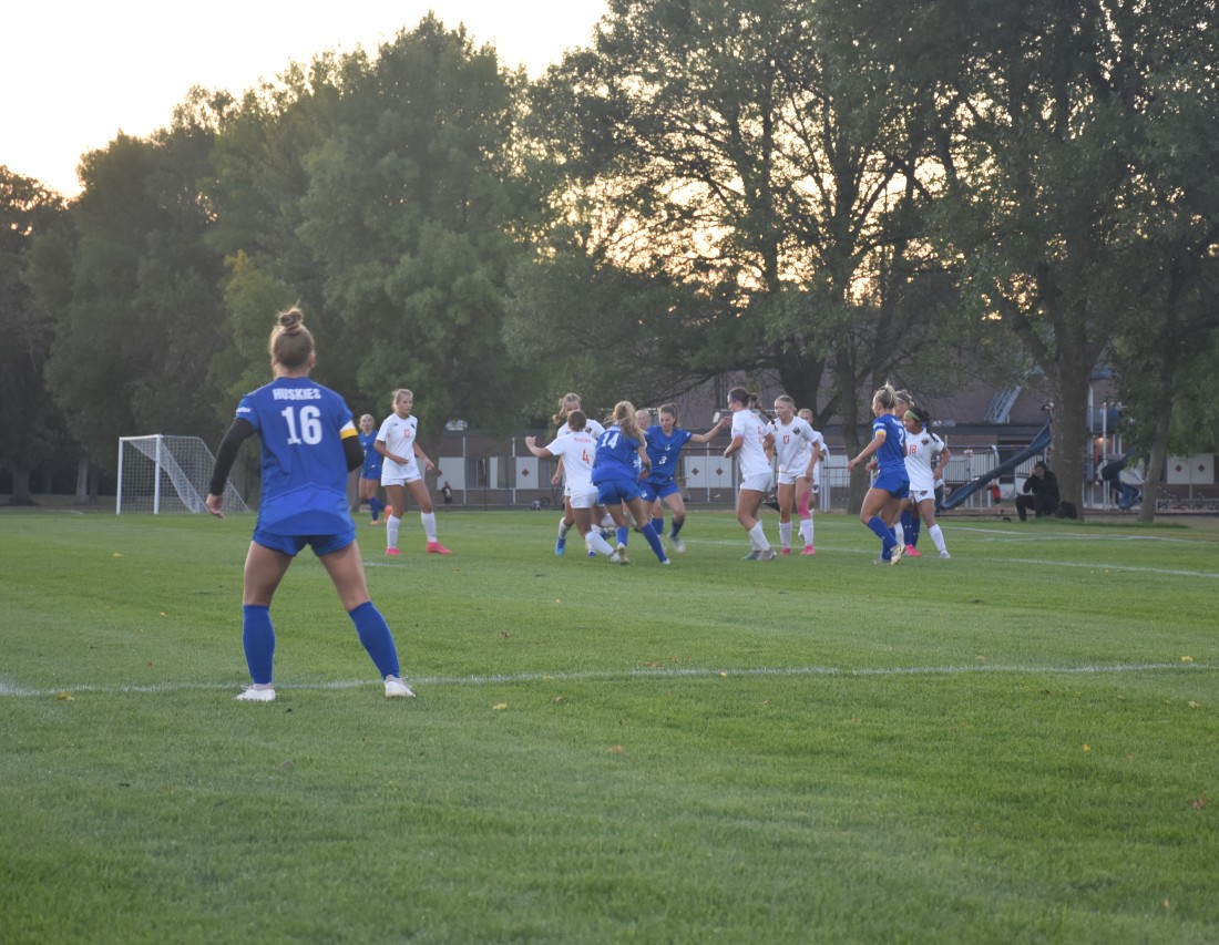 The Owatonna Girls soccer team battles for the ball in front the opposing teams net