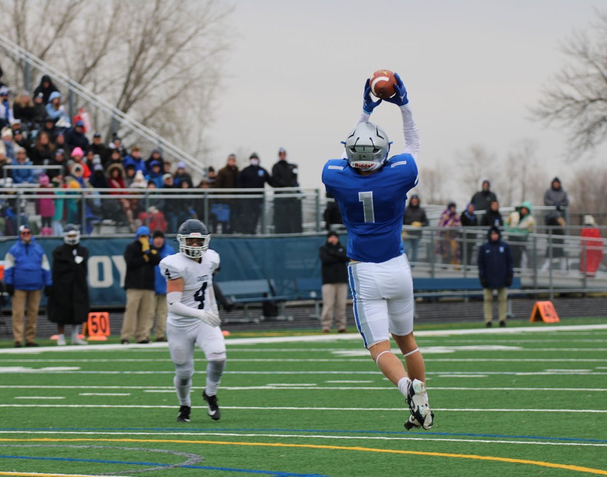 Senior captain Owen Beyer makes an attempted catch thrown by Jacob Ginskey. 