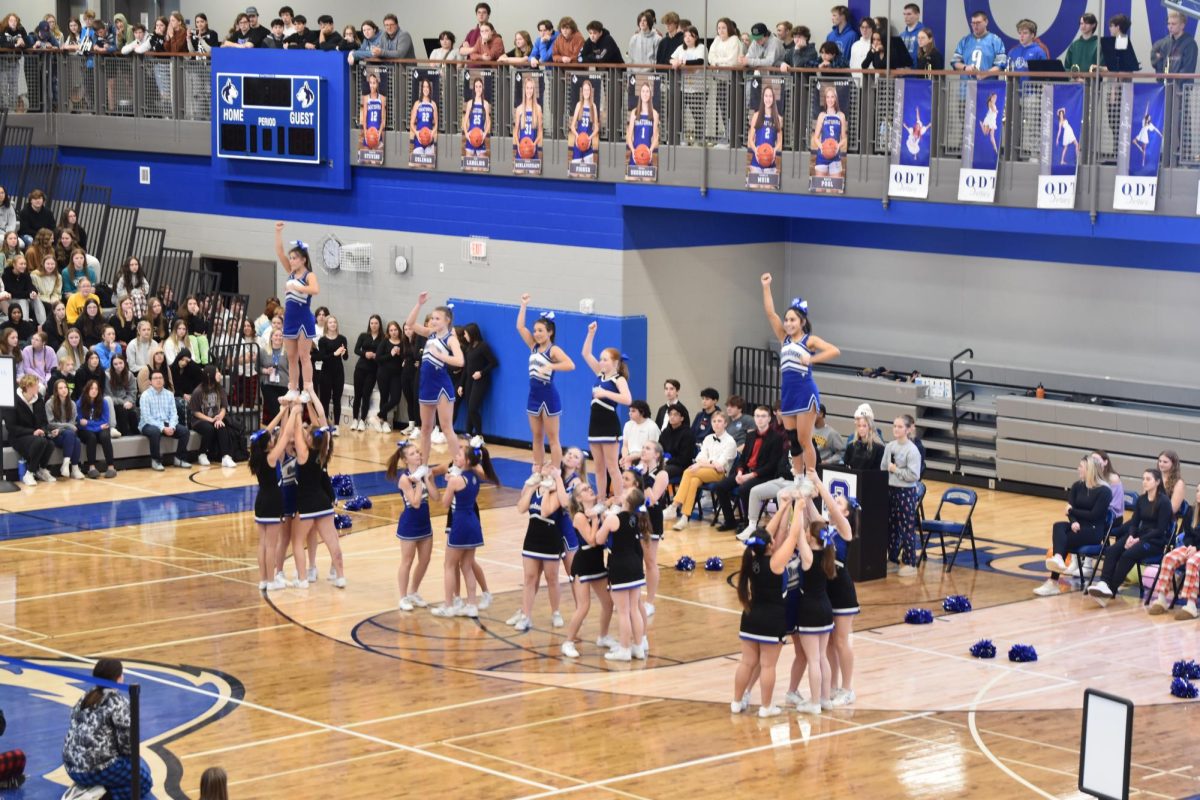 OHS Winter Cheerleading team doing their routine during the pepfest. 