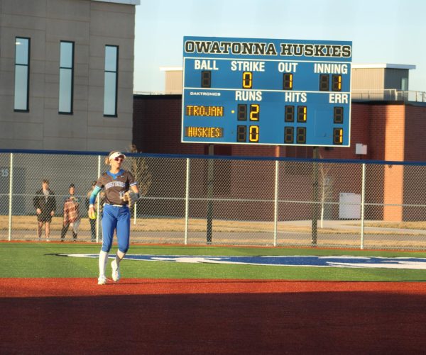 Kendra Bogen fields a ground ball at the new softball field at OHS.
