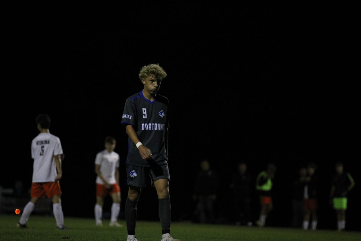 Freshman Logan Wilker walks off the field after attempted shot. 