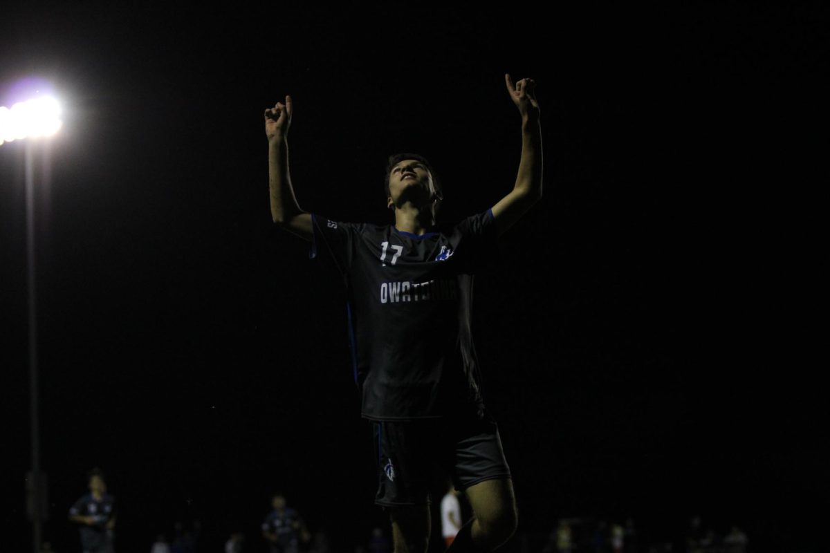 Junior Andrew Beaver celebrates after he scores a goal.