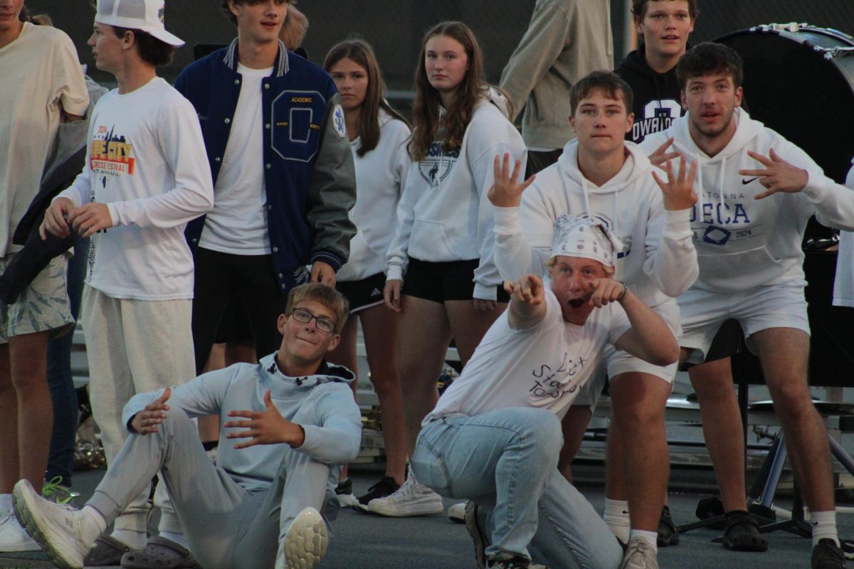 Senior Tanner Smith, junior Blake Farris, junior Logan Halverson and sophomore Carson Van Gelder strike a pose all together. 