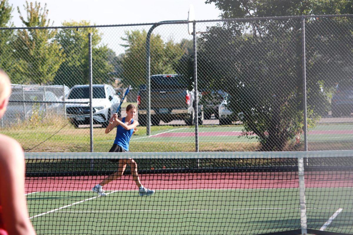 Sophomore Gabi Navarro after she returns the ball to her opponent. 