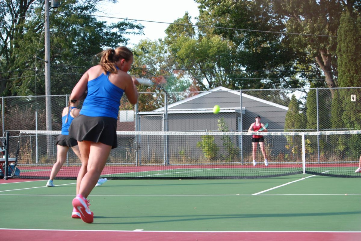 Freshman Greta Veldman returns the ball back to the opponent. 