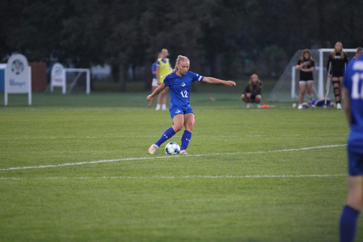 Senior Kelli Waypa kicking in after a foul call.